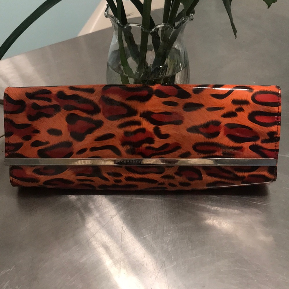 Patent leather animal print clutch